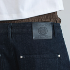 Maison Host Raw Denim Pleated Shorts